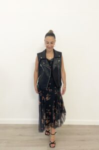 Gilet in eco pelle nera con zip e bottoni metallici